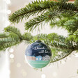Hand-Painted From Norwich With Love Bauble hanging from Christmas tree branch