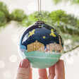 Model holding Hand-Painted From Norwich With Love Bauble