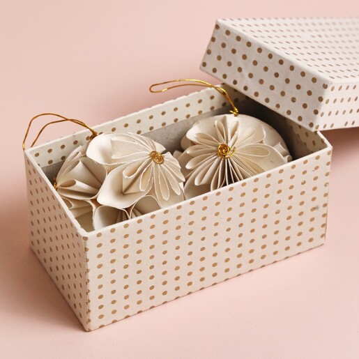 Afroart Set of 2 White and Gold Flower Ball Hanging Decorations in box against neutral coloured background