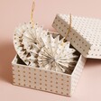 Afroart Set of 2 White and Gold Layered Pinwheel Hanging Decorations in packaging against neutral background