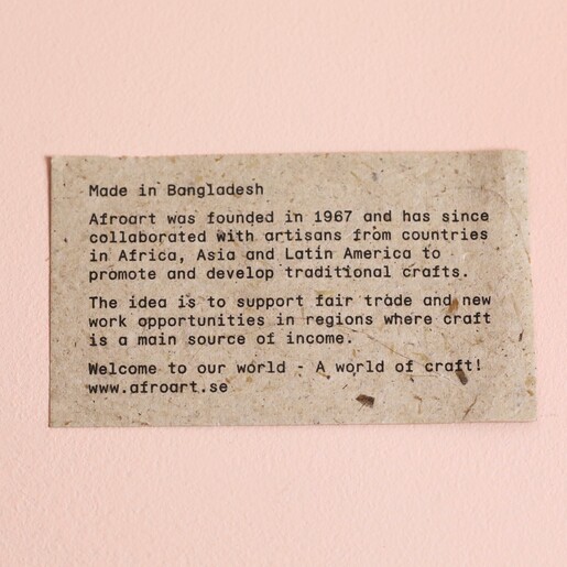 Information slip inside of Afroart Set of 2 White and Gold Layered Pinwheel Hanging Decorations box