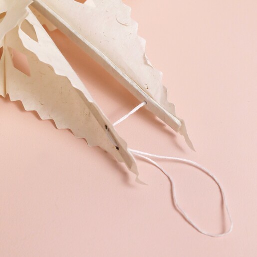 Close up of hanging loop on Afroart Sirius Star Hanging Decoration