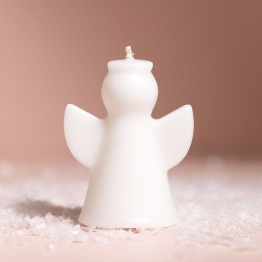 Afroart Small Angel Candle standing with snow around in front of neutral background