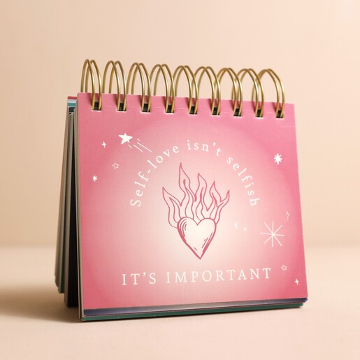 Celestial Positivity Flip Chart open on inside page against beige coloured backdrop