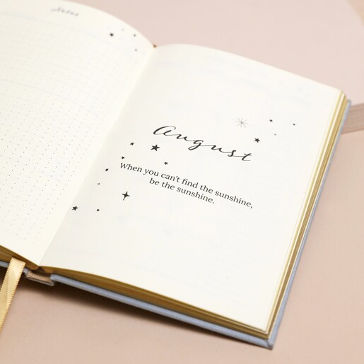 Dusky Blue 2024 Diary open on August page along with quote