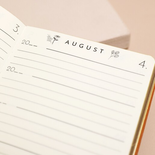Close up of month on top of page inside of Personalised Orange Five Year Thought a Day Journal