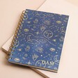 Personalised Initials Blue Starry Night Lined Notebook on top of beige backdrop