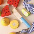 Close up of knife and fruit in Personalised Cutting Fruit Chef Set Game