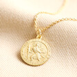Large Personalised Gold Sterling Silver St Christopher Disc Pendant Necklace on Beige Fabric