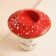 House of Disaster Forage Mushroom Tea Light Holder on Pink Surface