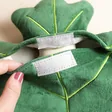 Close up of velcro fastening on House of Disaster Secret Garden Hedgehog Hot Water Bottle
