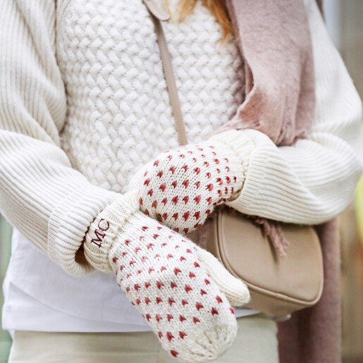 Model adjusting mittens wearing Rectangular Crossbody Bag in Beige 