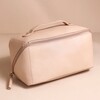 Rectangular Makeup Bag in Pink in front of beige coloured background