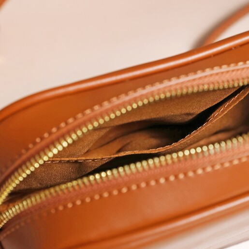 Rectangular Crossbody Bag in Tan Rectangular Crossbody Bag in Tan open on top of beige coloured backdrop