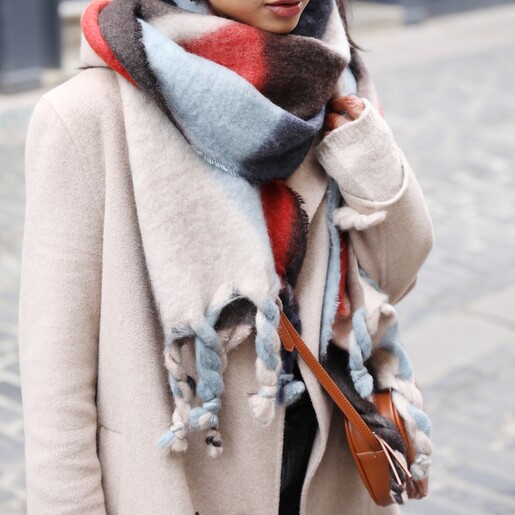 Bag on Model Model wearing Rectangular Crossbody Bag in Tan with abstract winter scarf