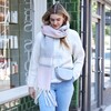 Vegan Leather Half Moon Crossbody Bag in Light Grey on Model Walking Down Street