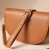 Vegan Leather Half Moon Crossbody Bag in Tan With Strap Draped Over Top