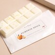 Lisa Angel Pumpkin Spice Soy Wax Melts out of packaging on top of neutral surface