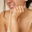 Estella Bartlett Paw Charm Bracelet In Silver on Smiling Model
