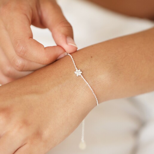 Estella Bartlett Paw Charm Bracelet In Silver on Model's Wrist