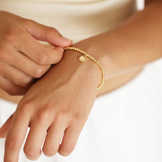 Estella Bartlett Pearl Buttercup Bracelet In Gold On Model
