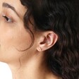 Estella Bartlett Kiss Stud Earrings In Gold in Curated Ear Look on Model