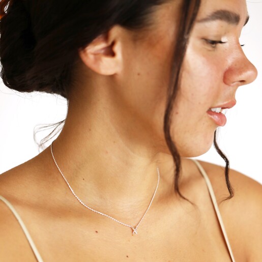 Estella Bartlett Kiss Pendant Necklace in Silver on Model