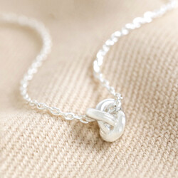 Estella Bartlett Knot Pendant Necklace in Silver