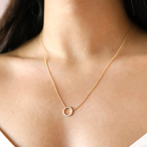 Estella Bartlett Pave Circle Pendant Necklace in Gold on Model