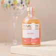 100ml Edmunds Cocktails Paloma on neutral surface with natural coloured background