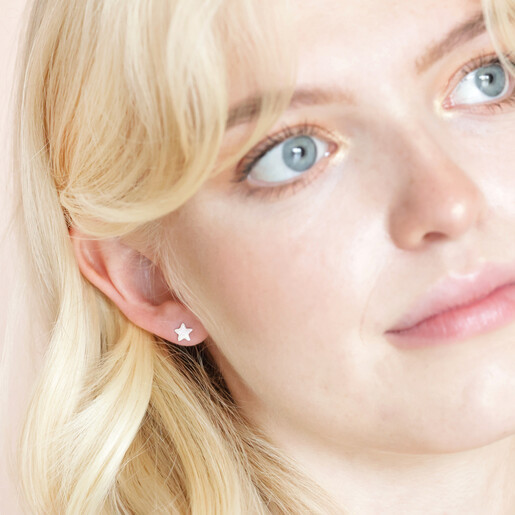 Model looking up wearing Sterling Silver Glitter Enamel Star Stud Earrings 