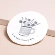 East of India Amazing Things Coaster on Beige Surface