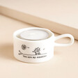 East of India You Are My Sunshine Tealight Holder on top of beige coloured fabric