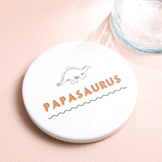 Papasaurus Organic Shape Coaster on White Surface