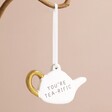 You're Tea-rific Teapot Hanging Decoration on Pink Background