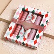 The Chocolate Gift Company Chocolate Christmas Crackers on Beige Snow Covered Surface