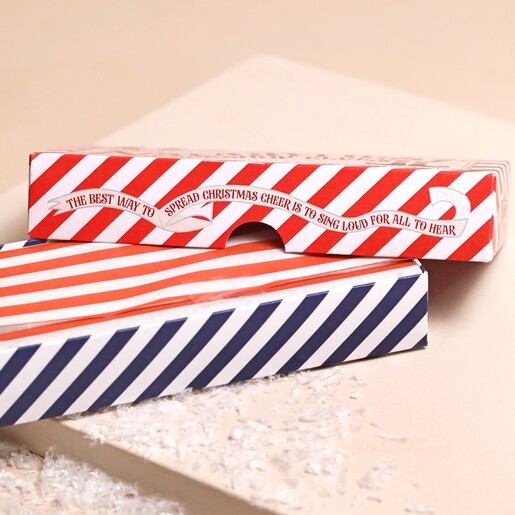 The Chocolate Gift Company Naughty Chocolate Elves Box open showing the paper inside 