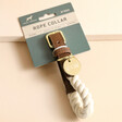 Personalised Field + Wander Natural Rope Dog Collar leaning against raised beige surface