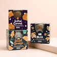 Gnaw Sweet Orange Hot Chocolate Bombe with other hot chocolate bombe flavours against neutral background