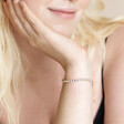 Close up of model wearing the Crystal Tennis Bracelet in Gold