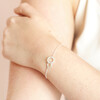 Model Wearing Interlocking Pearl and Crystal Hoops Bracelet in Silver