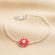 Pink Enamel Daisy Charm Bracelet in Silver on Beige Fabric