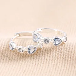 Blue Crystal Heart Huggie Hoop Earrings in Silver