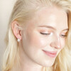 Clear Crystal Pavé Square Huggie Hoop Earrings in Gold on Smiling Model