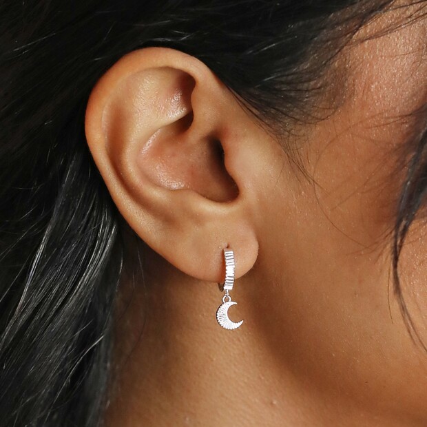 Moon and Sun Huggie Hoop Earrings in Silver Moon and Sun Huggie Hoop Earrings in Silver