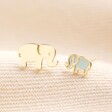 Mum and Baby Elephant Stud Earrings in Gold on Beige Fabric