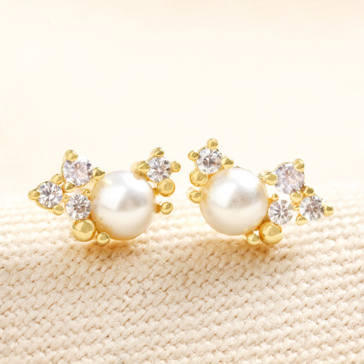 June Earrings June Birthstone Cluster Stud Earrings in Gold on Beige Fabric