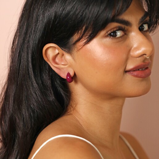 Model Wearing Purple Domed Resin Hoop Earrings
