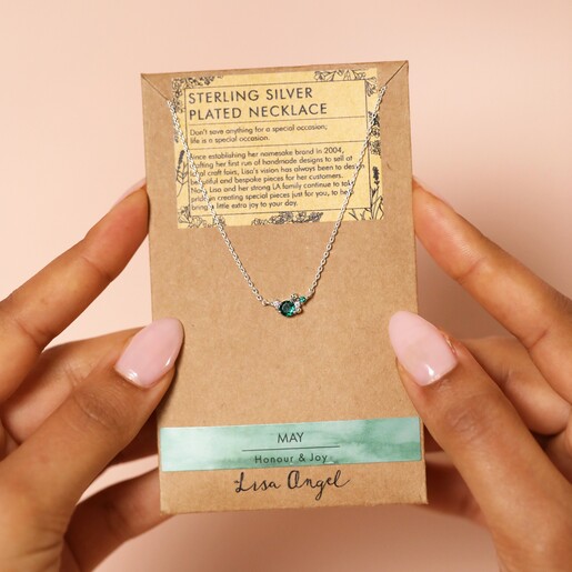 Model Holding Birthstone Cluster Necklace in Silver