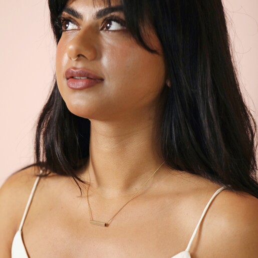 Model Wearing Hexagonal Barrel Pendant Necklace in Gold